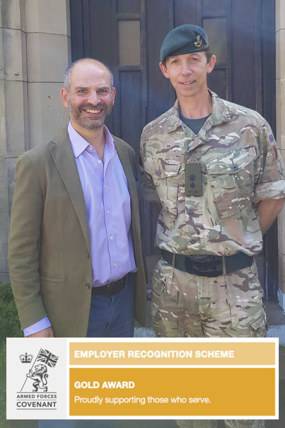 Dave Hill with a Rifles soldier and the Armed Forces Covenant Gold Award badge